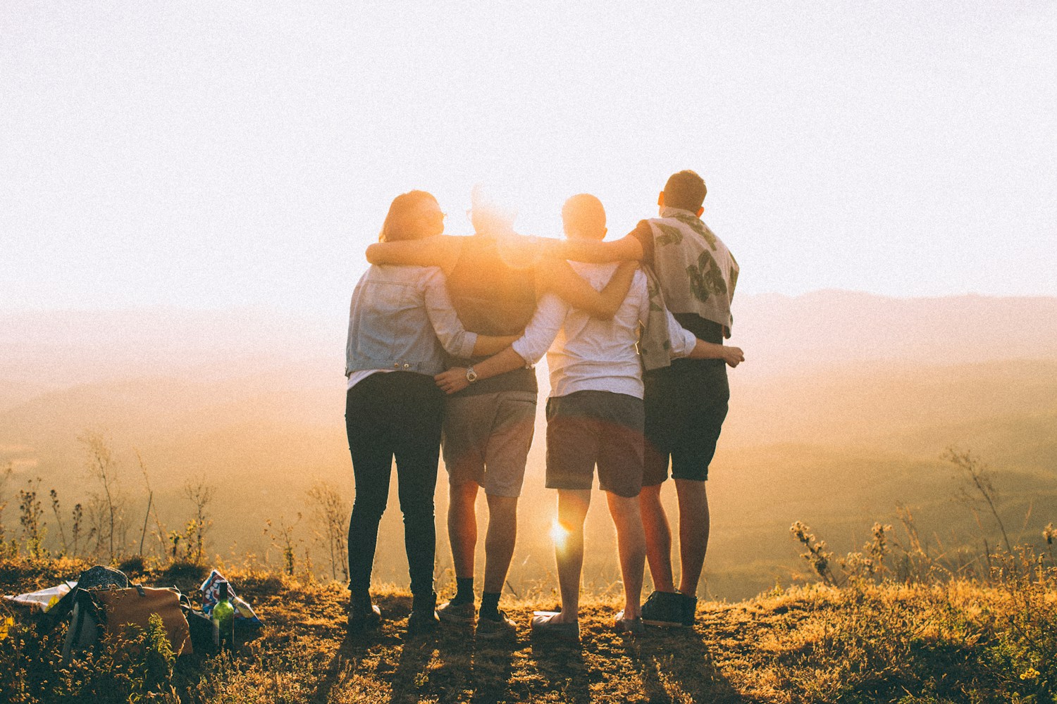 Friends sharing a moment together at an outdoor gathering